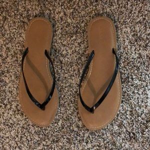 Black flip flop sandals